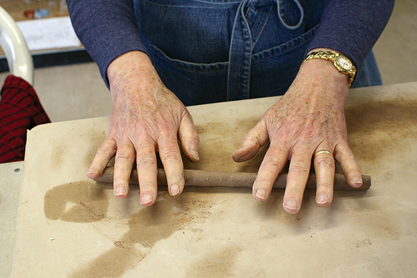 Woman working with clay